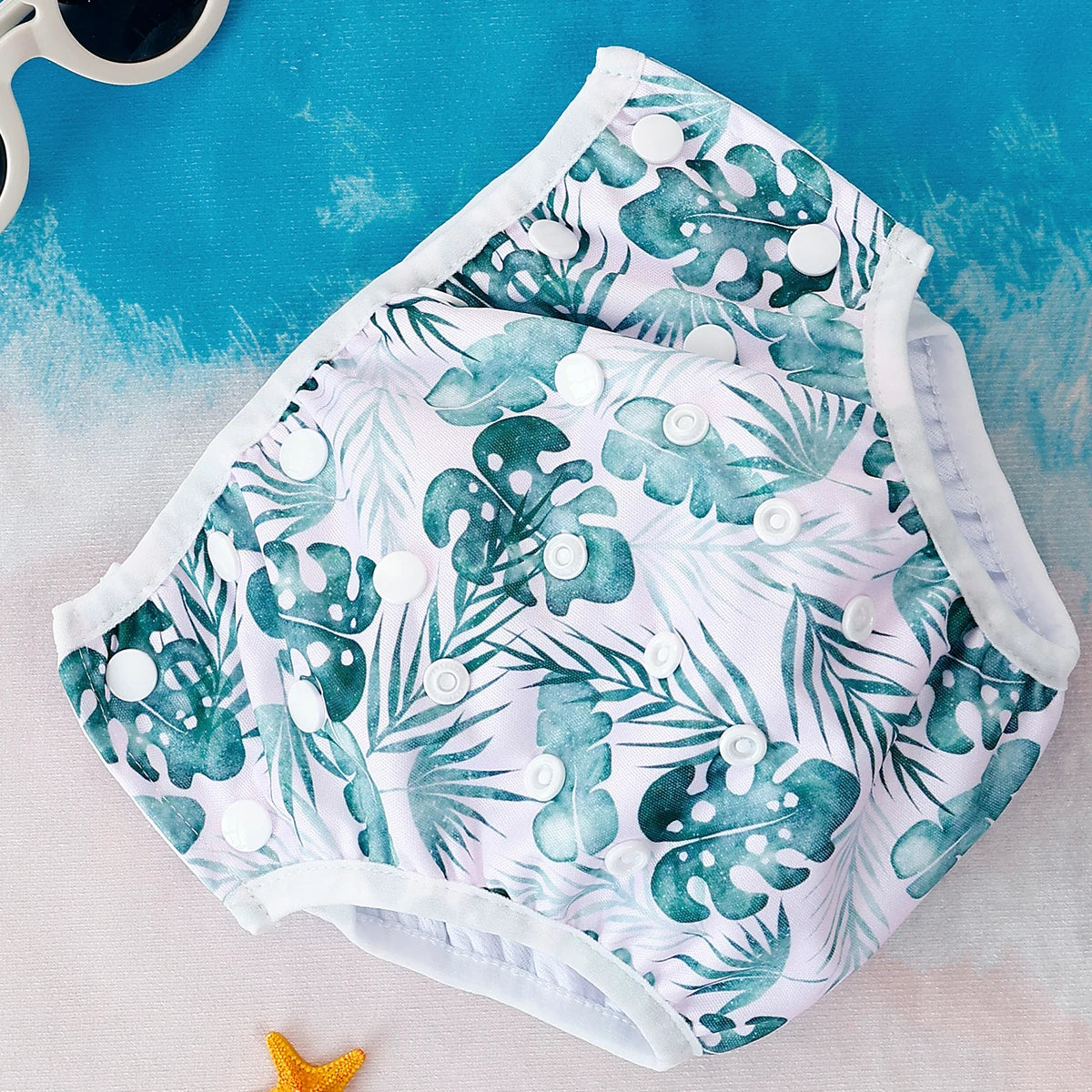 Baby Bubble washable, adjustable fit baby swim diapers shown in a colorful design, ideal for safe water play.