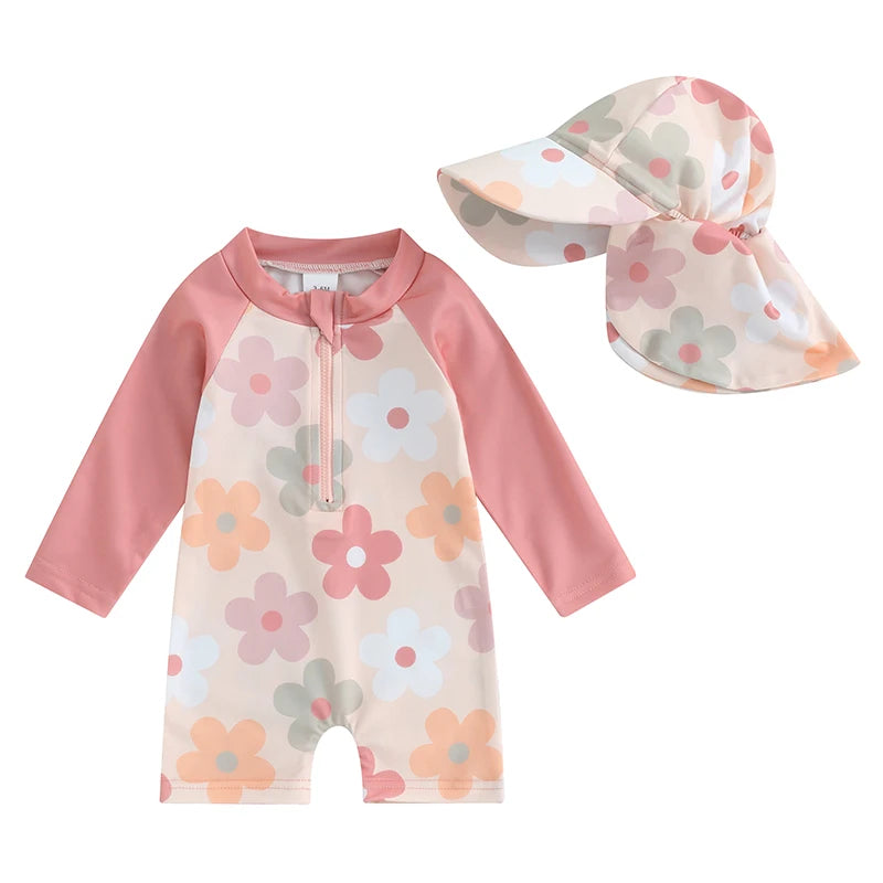 Baby boys rash guard set with turtle and dinosaur print by Baby Bubble, featuring colorful, comfortable sun protection clothing.