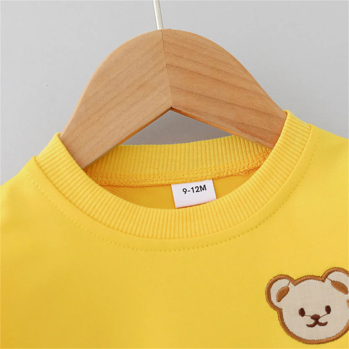 Baby Bubble Little Bear outfit featuring a cute two-piece set with bear-themed design, perfect for infants and toddlers.