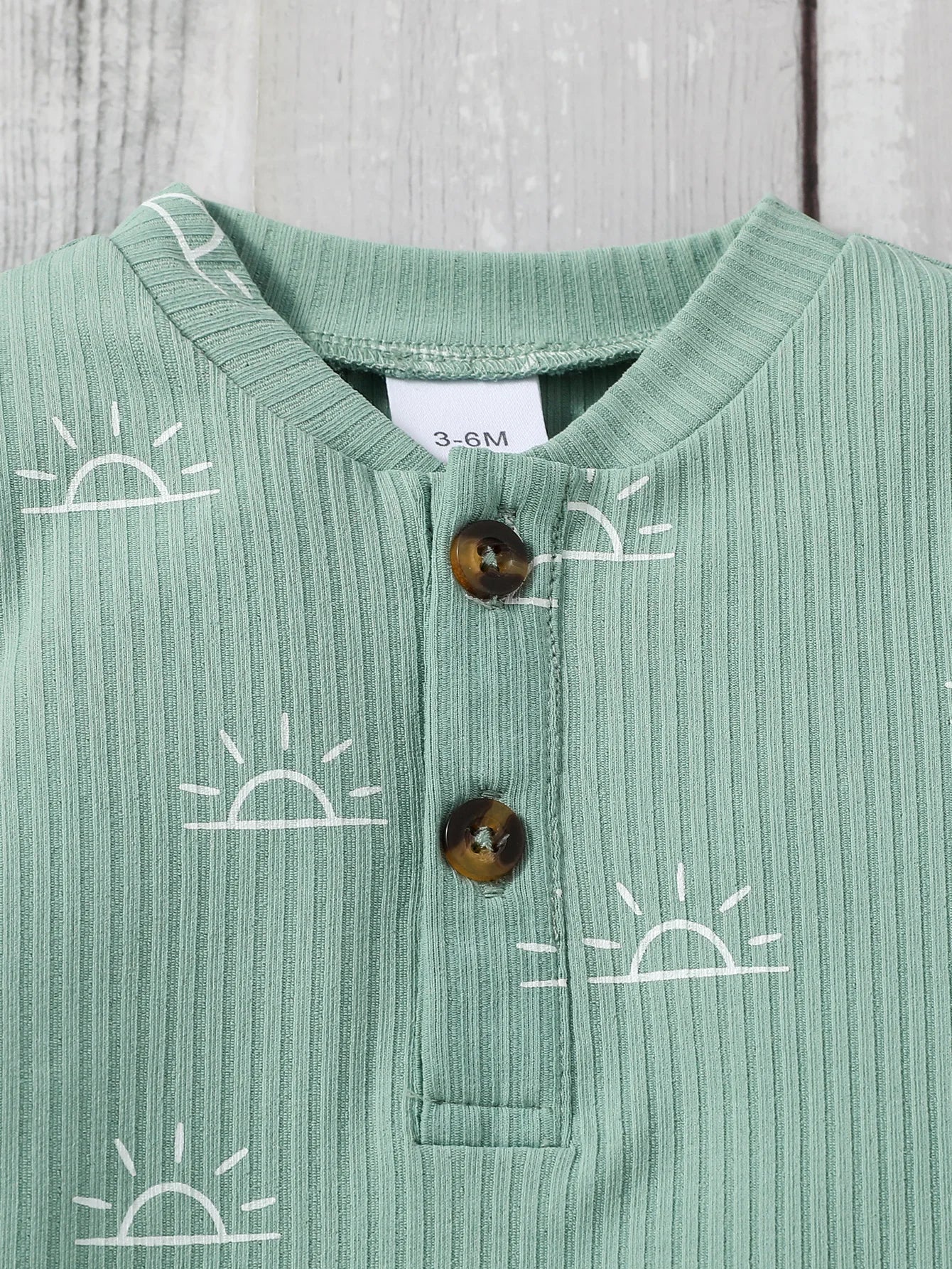 Baby boy outfit featuring a baby bubble jumpsuit and matching pants, soft fabric and cute design for little boys.