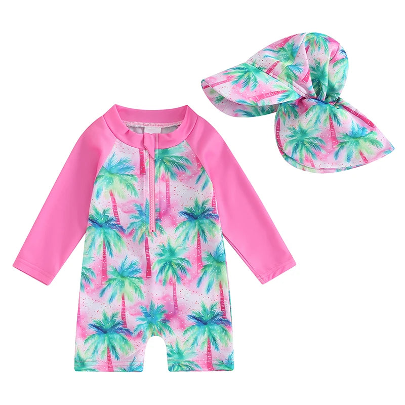 Baby boys rash guard set with turtle and dinosaur print by Baby Bubble, featuring colorful sun protection swimwear.
