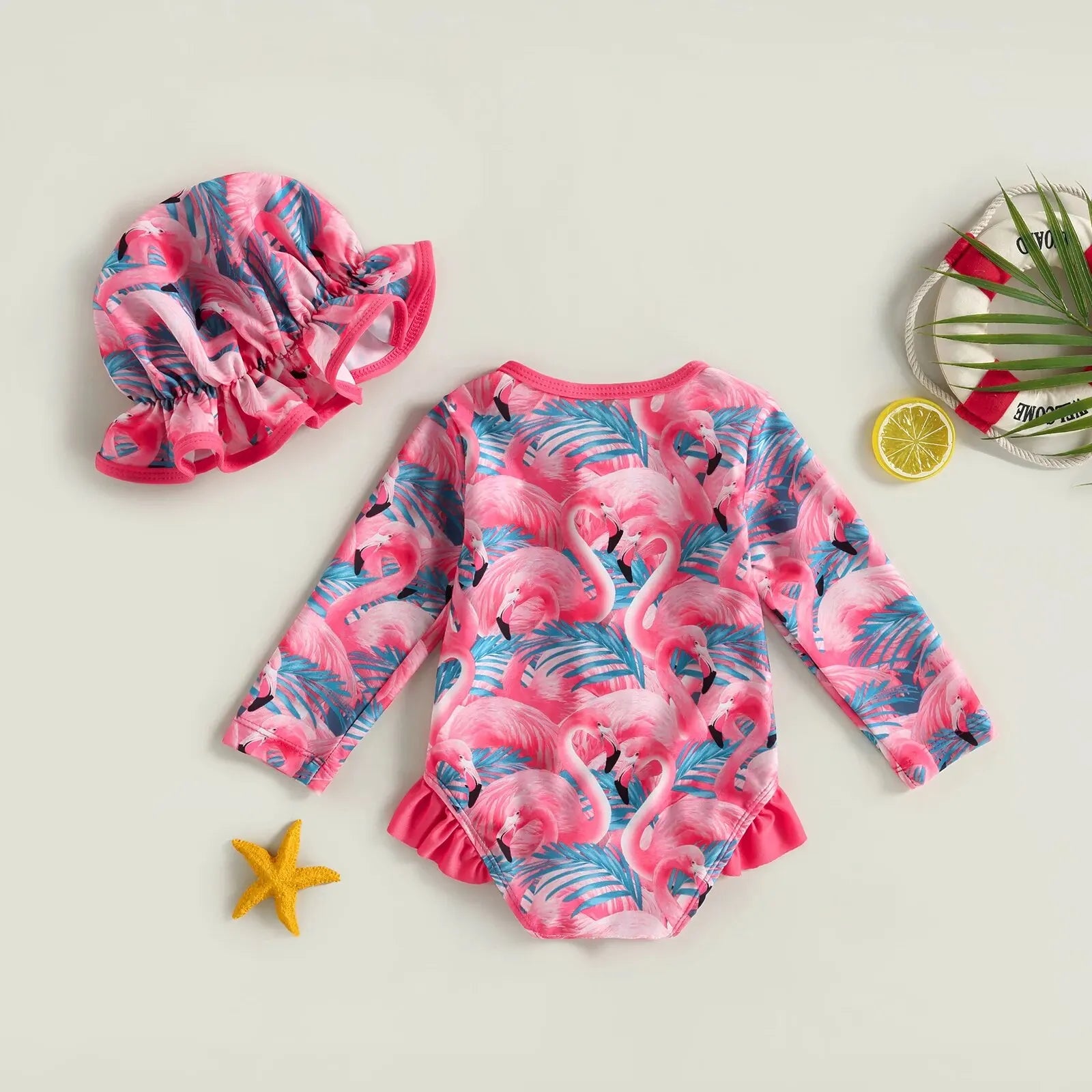 Baby Girl one-piece swimsuit with floral flamingo print by Baby Bubble, featuring bright colors and a cute, comfortable design for swimming.