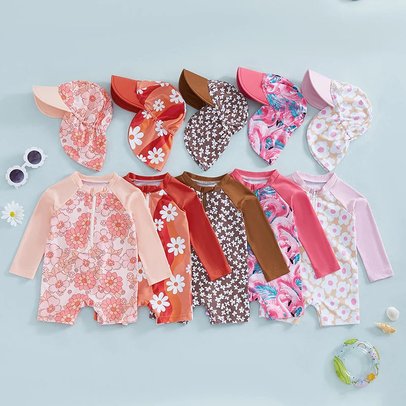 Baby girls' rash guard set with floral and flamingo print from Baby Bubble, featuring a colorful long-sleeve swimwear outfit.