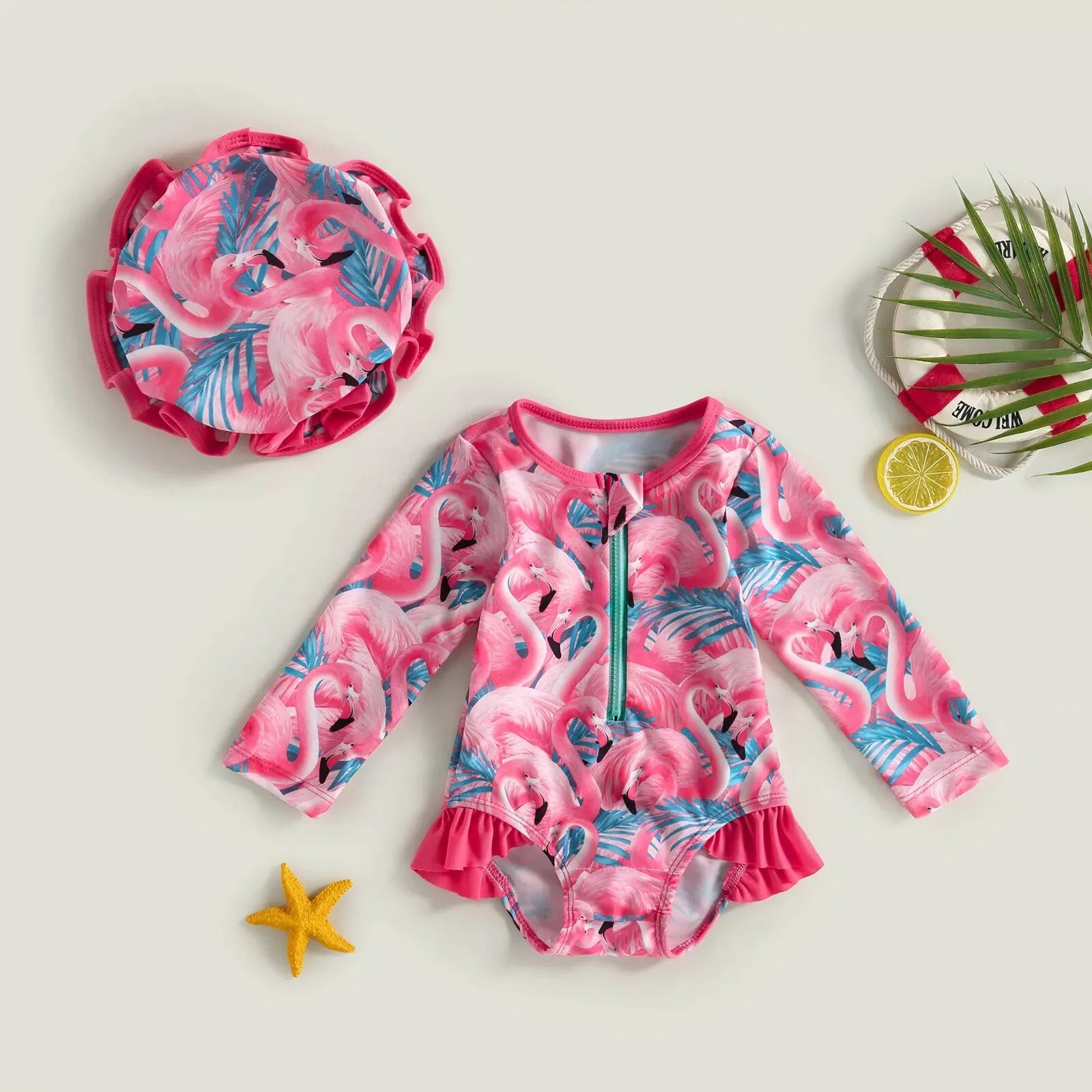 Baby girl wearing a floral flamingo print one-piece swimsuit by Baby Bubble, featuring colorful flamingo and tropical floral design.