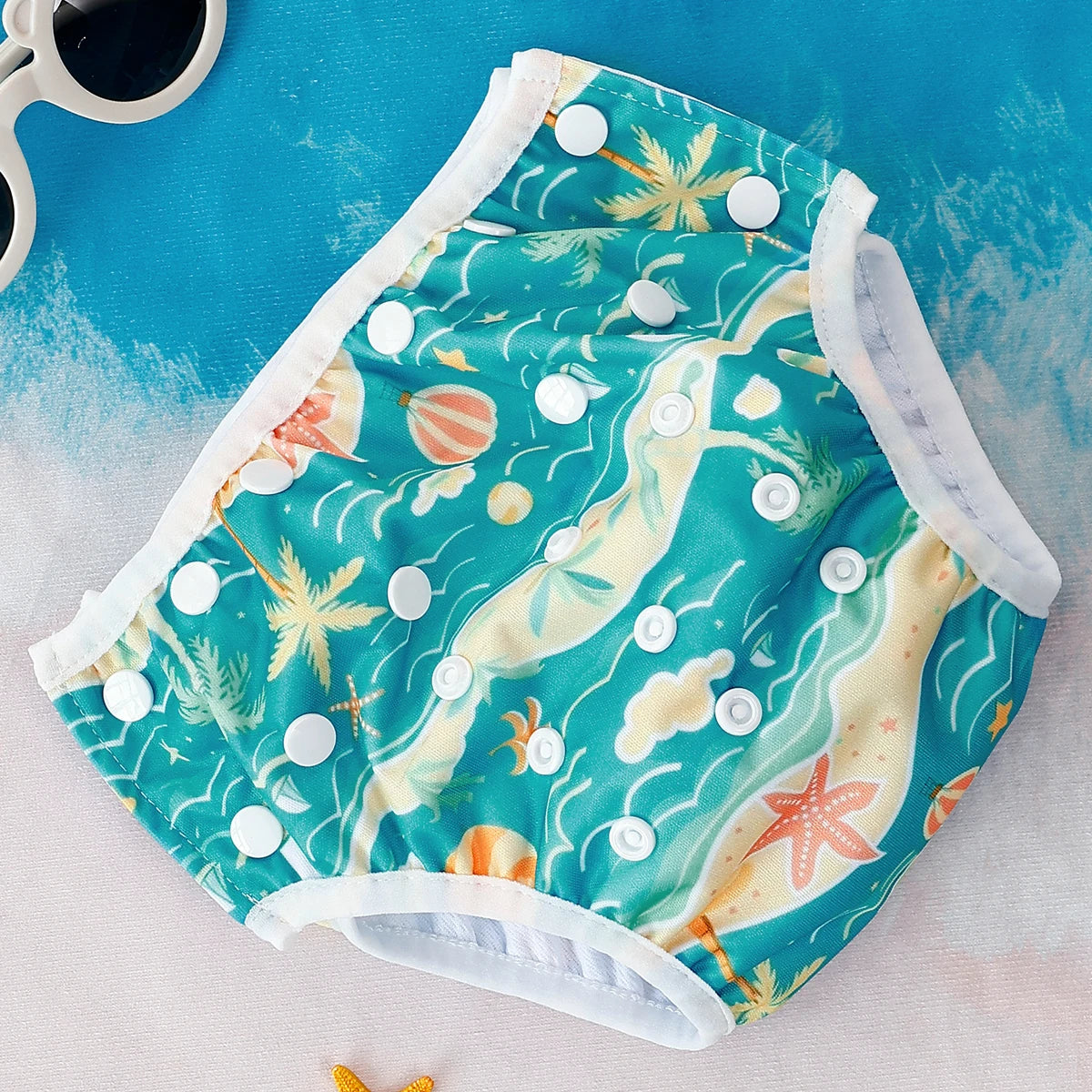 Baby Bubble washable baby swim diapers with adjustable fit, featuring colorful waterproof fabric and secure elastic waistband.
