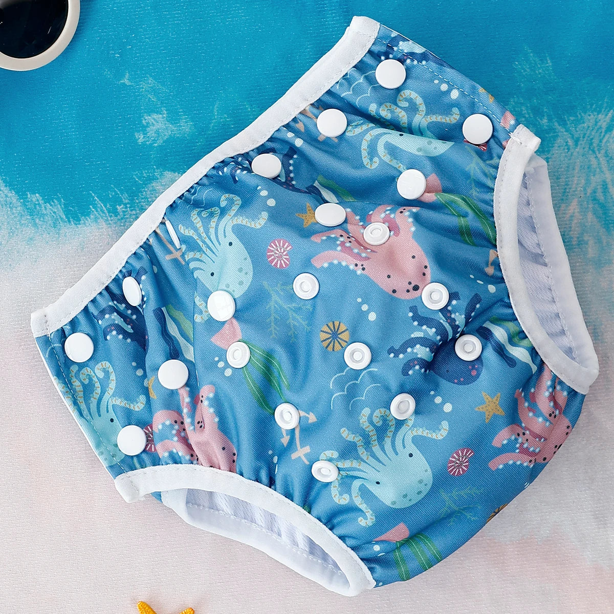 Baby Bubble washable baby swim diapers with adjustable fit, shown in vibrant colors and soft waterproof material for comfortable swimming.