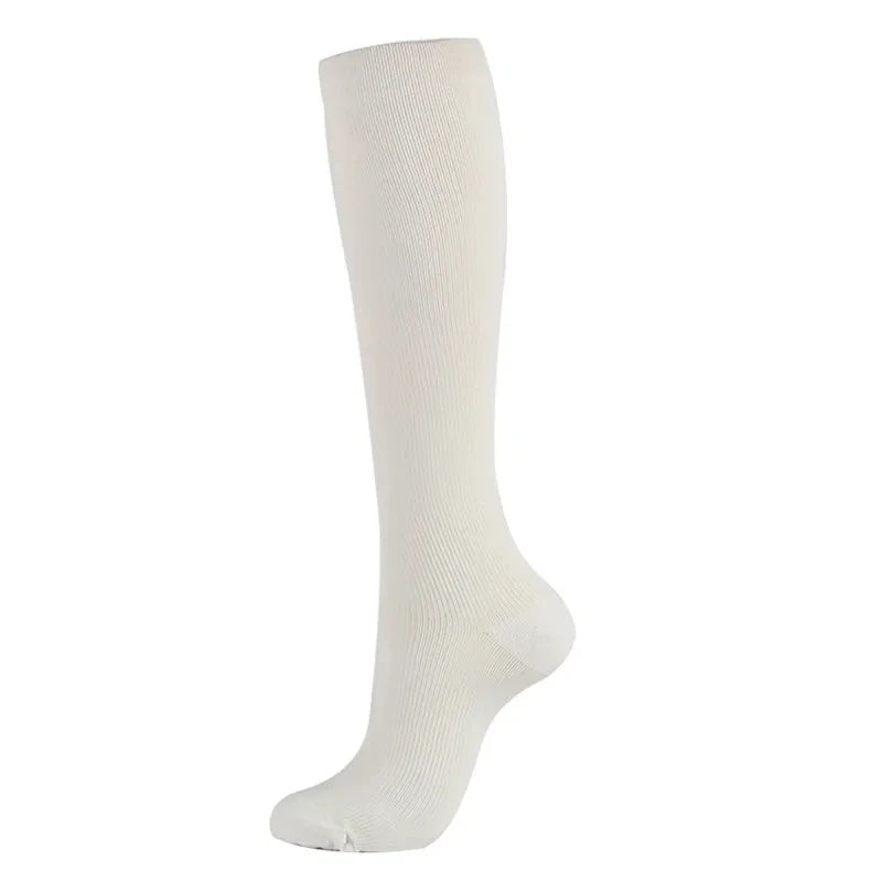 Pregnancy compression socks by Baby Bubble, designed to improve circulation, shown on a pregnant woman’s legs.