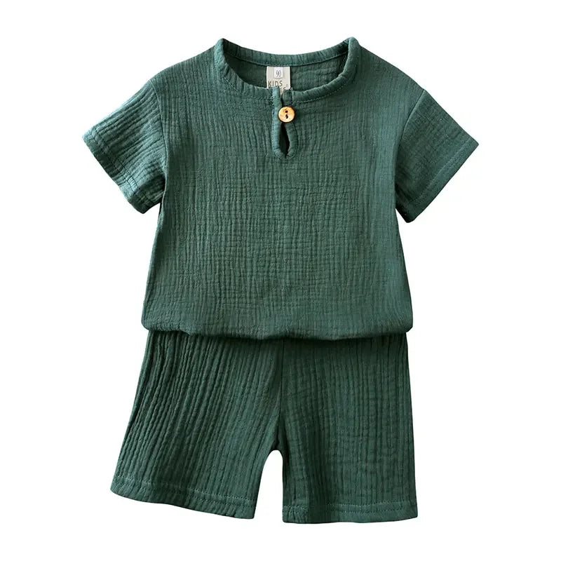 Kids cotton linen summer outfit by Baby Bubble featuring a breathable, lightweight set with a shirt and shorts for warm weather.