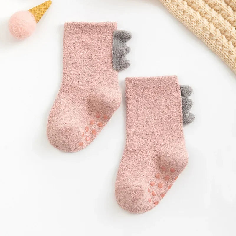 Baby Dinosaur Socks by Baby Bubble, soft and warm baby socks featuring colorful dinosaur designs for infants.