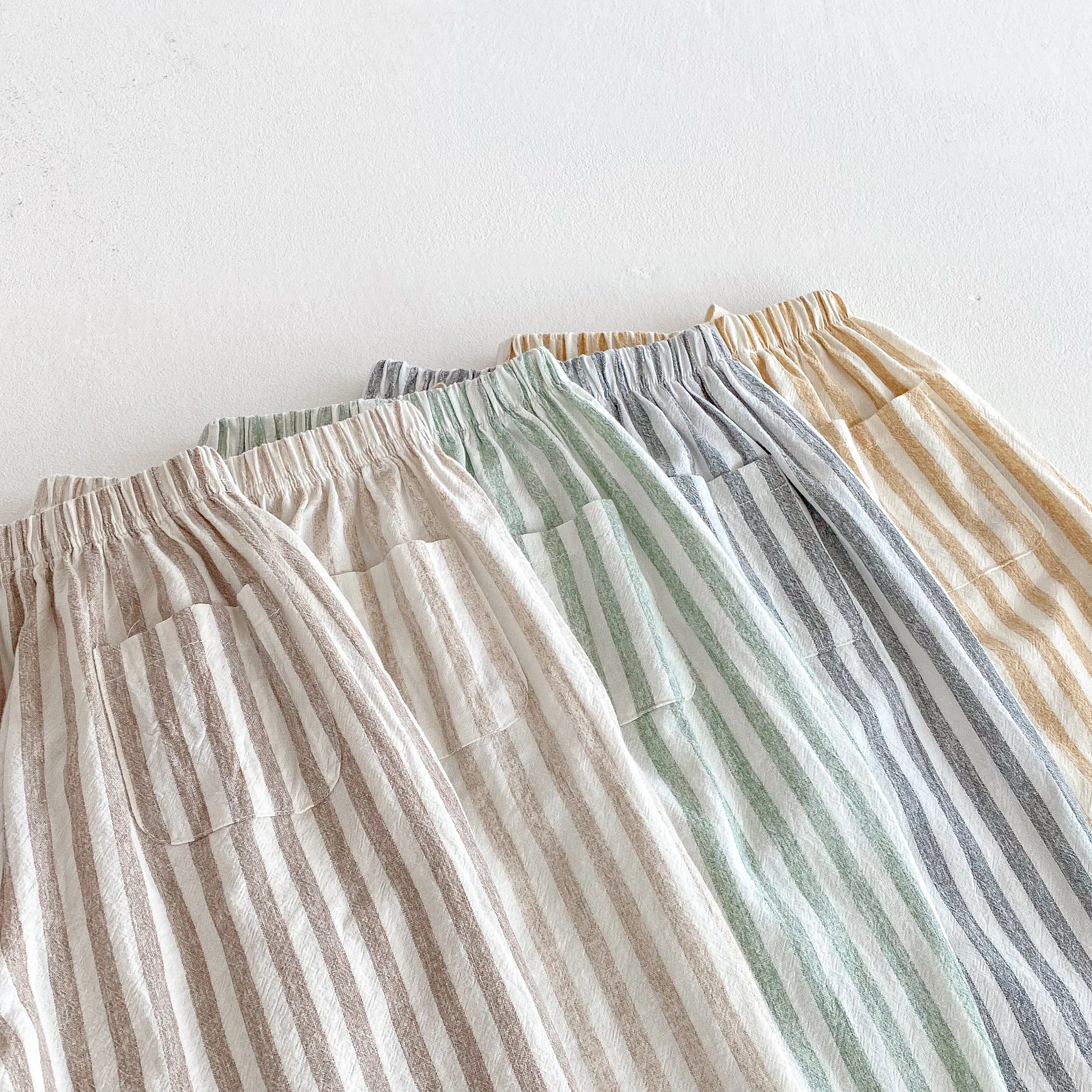 Toddler's Baby Bubble striped trousers with comfortable fit, featuring colorful horizontal stripes and elastic waistband.