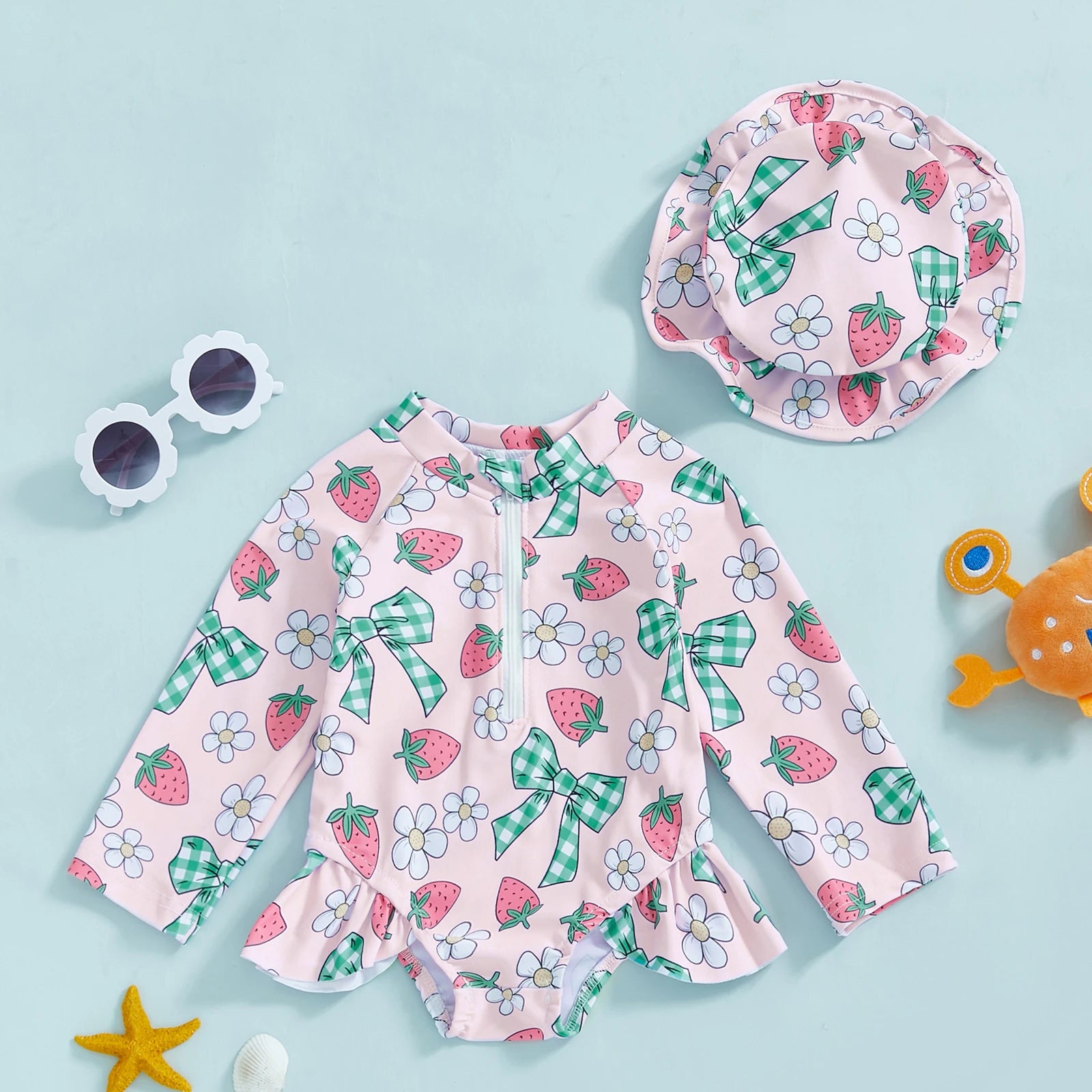 Baby girls floral rash guard with hat by Baby Bubble, featuring a zip-up design and vibrant floral pattern for sun protection.
