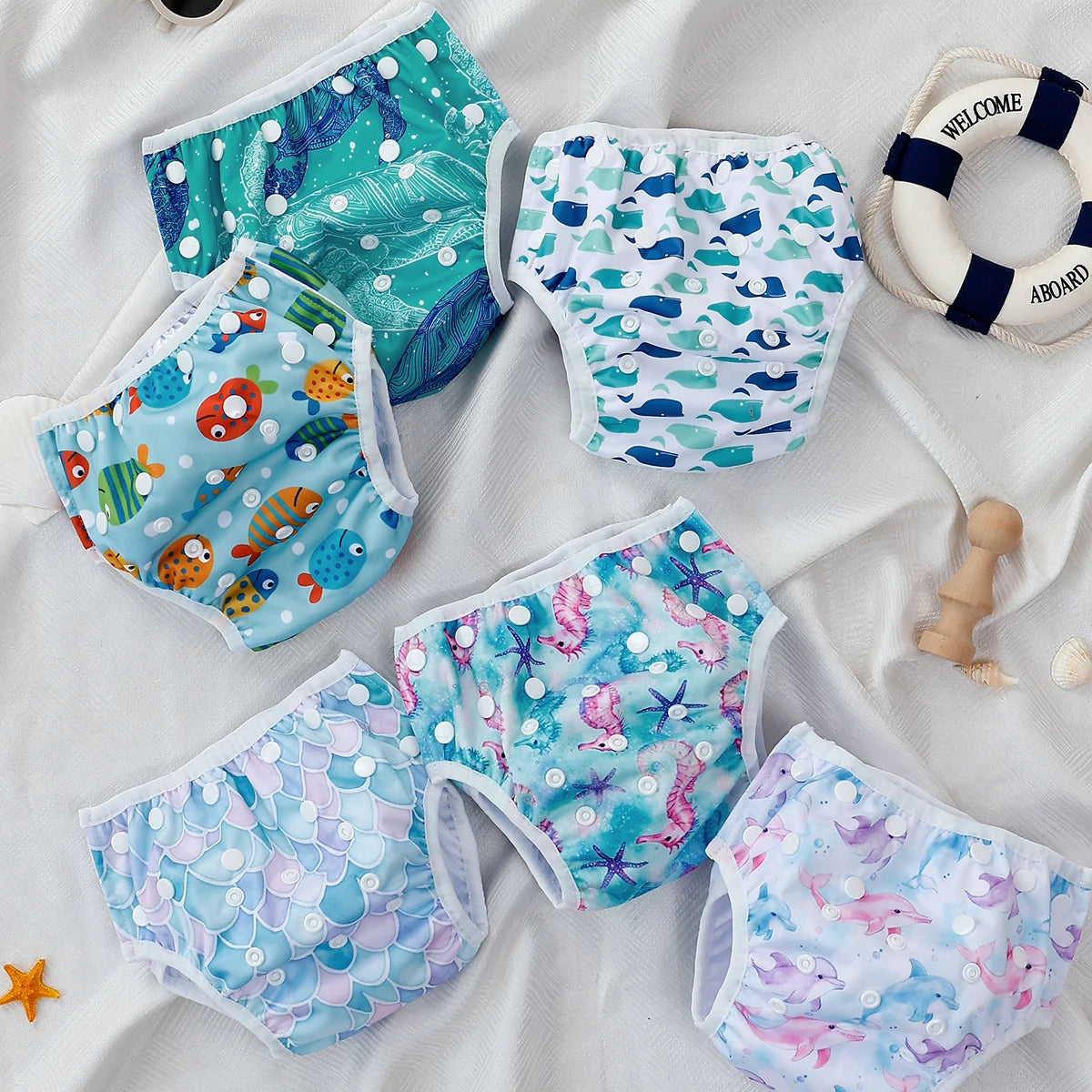 Baby Bubble washable baby swim diapers with adjustable fit, featuring waterproof material and colorful patterns for comfortable swimming.