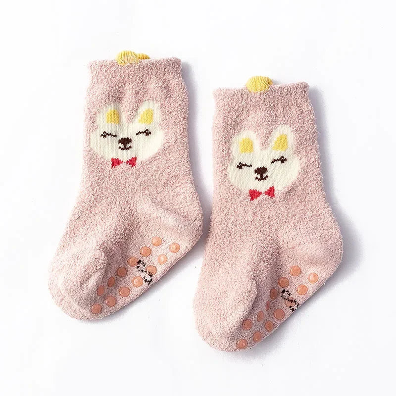 Baby Dinosaur Baby Socks by Baby Bubble, warm and soft newborn socks featuring colorful dinosaur patterns for infants.