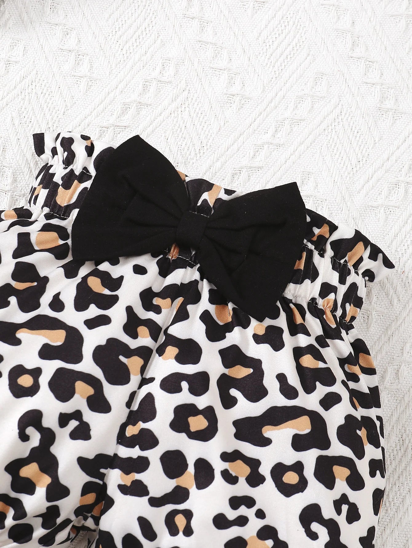 Baby Bubble summer baby jumpsuit set with leopard print, featuring playful design and comfortable fabric for infants.