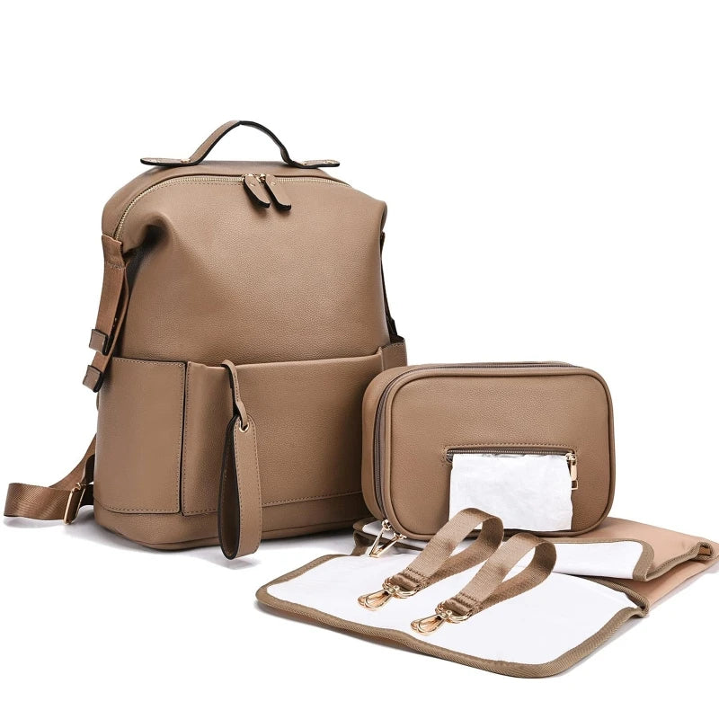 Large leather diaper bag backpack by Baby Bubble, stylish and spacious for carrying baby essentials.