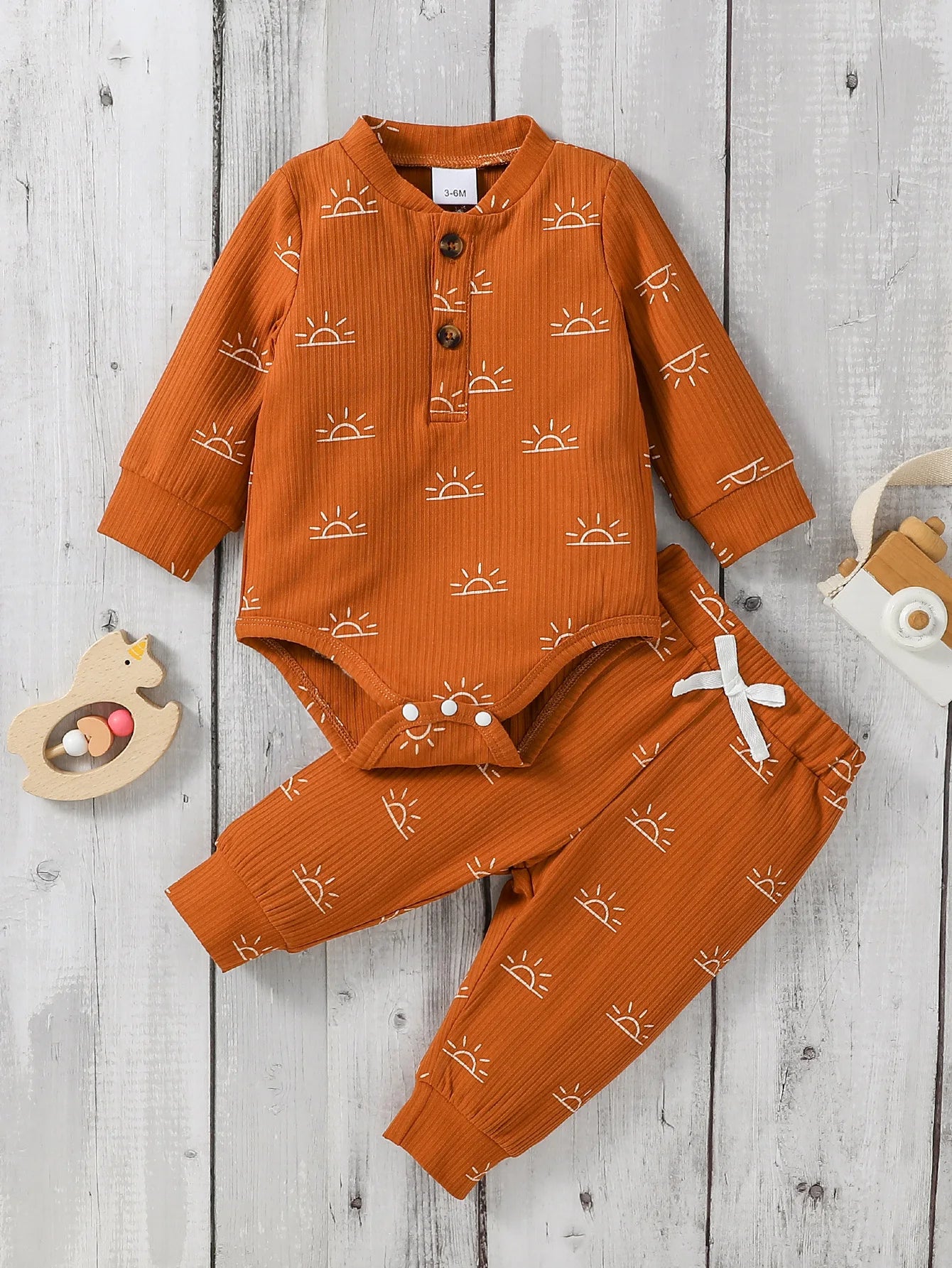 Baby Boy 2-piece outfit with a jumpsuit and pants from Baby Bubble, soft and comfortable baby boy clothing set.
