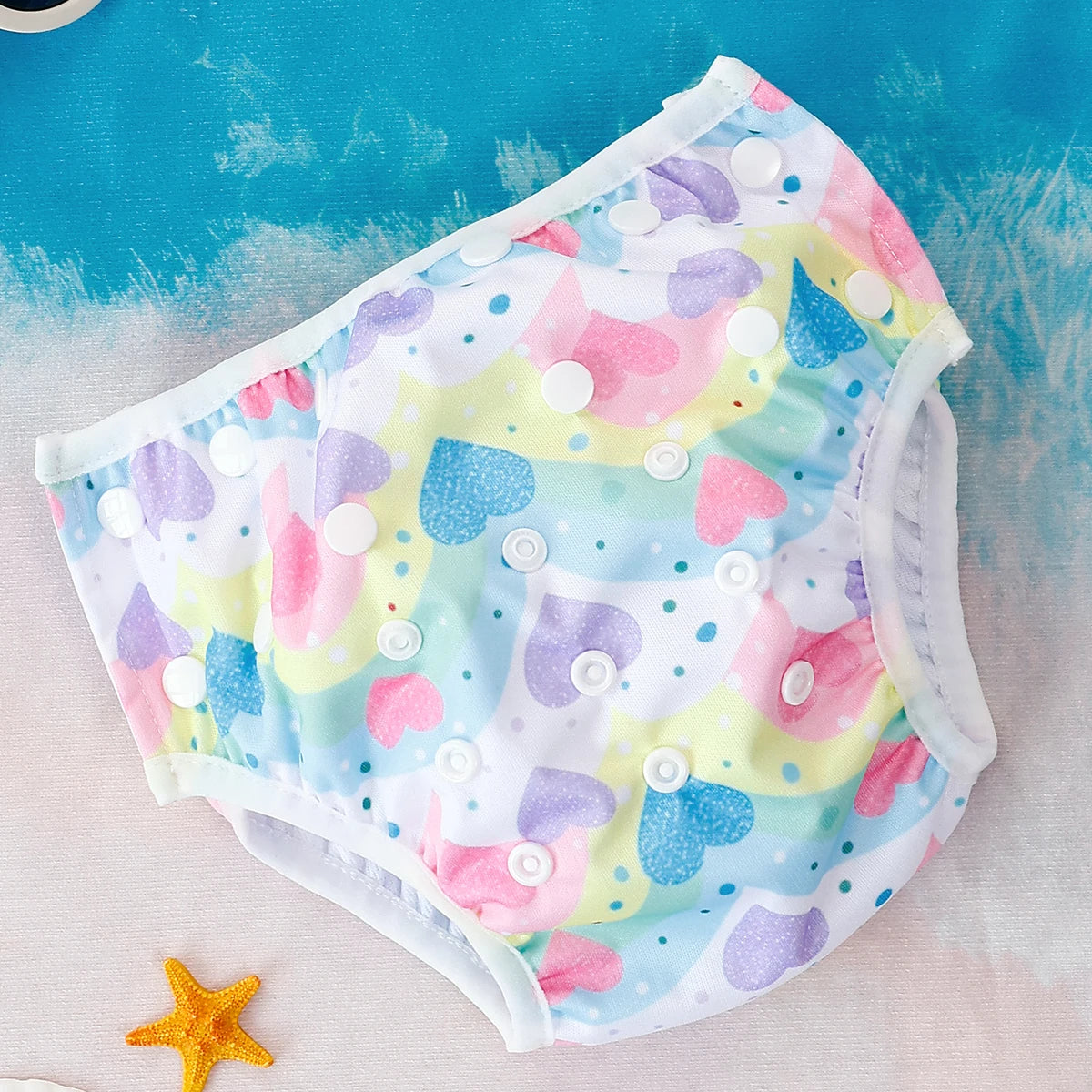 Reusable baby swim diapers with colorful animal print from Baby Bubble, designed for comfortable swimming and water play.