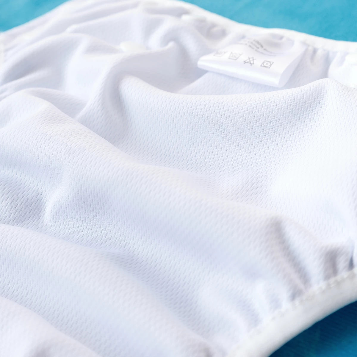 Baby Bubble washable and adjustable baby swim diapers in bright colors, designed for comfortable fit during swimming.