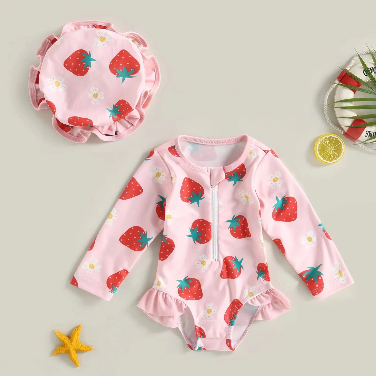 Baby girl wearing a floral flamingo print one-piece swimsuit by Baby Bubble, featuring colorful tropical floral and flamingo design.