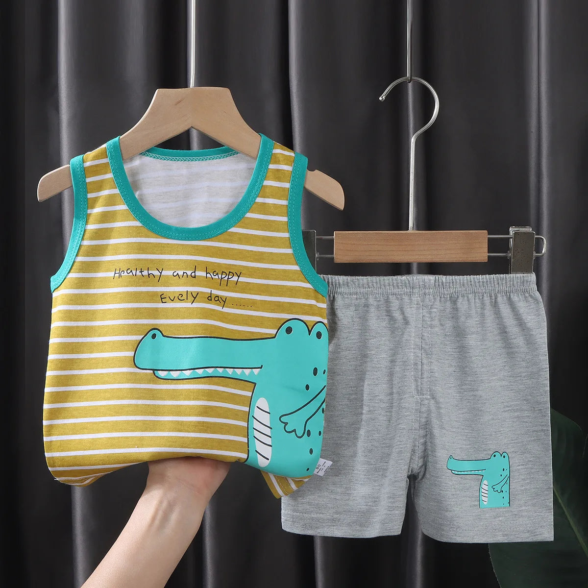 Baby Bubble children's summer set with a tank top and shorts, featuring colorful patterns and lightweight fabric for warm weather.