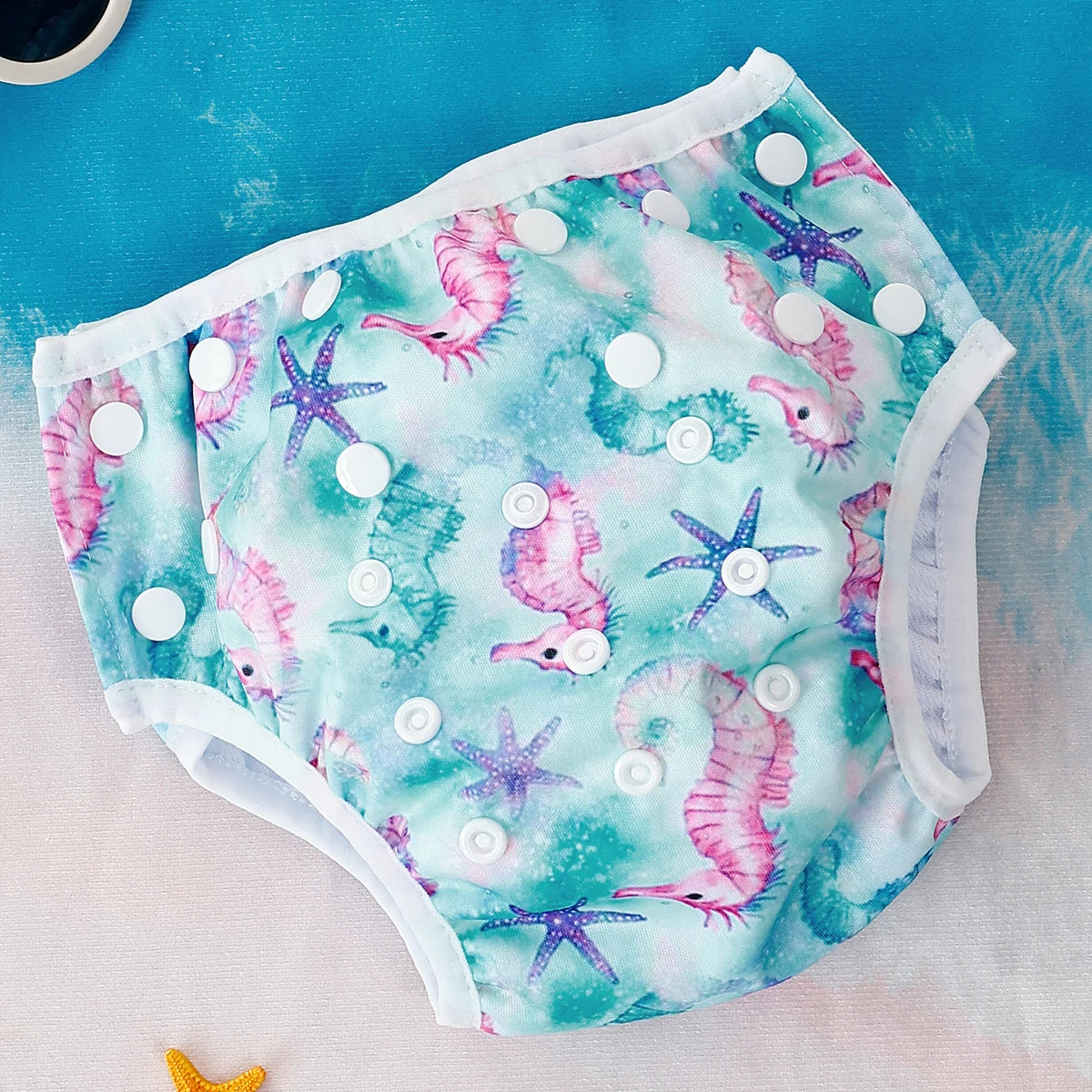 Baby Bubble washable baby swim diapers with adjustable fit, shown in a close-up image highlighting the waterproof material and snug design.