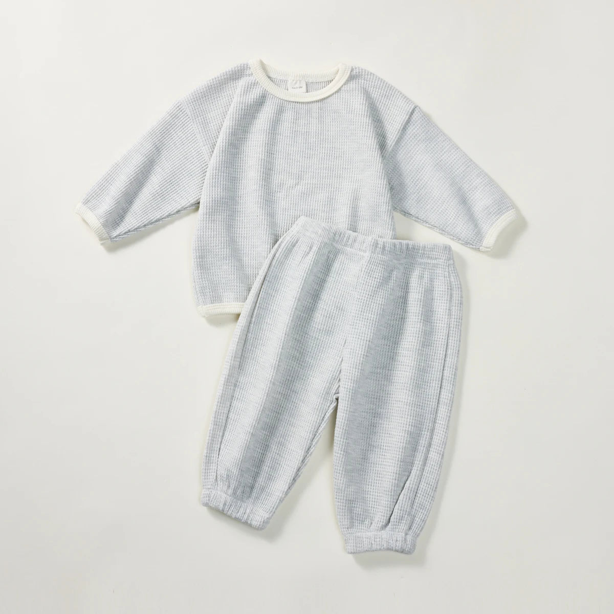 Korean Waffle Suit by Baby Bubble, a cozy 2-piece set made from soft waffle fabric, perfect for comfortable daily wear.
