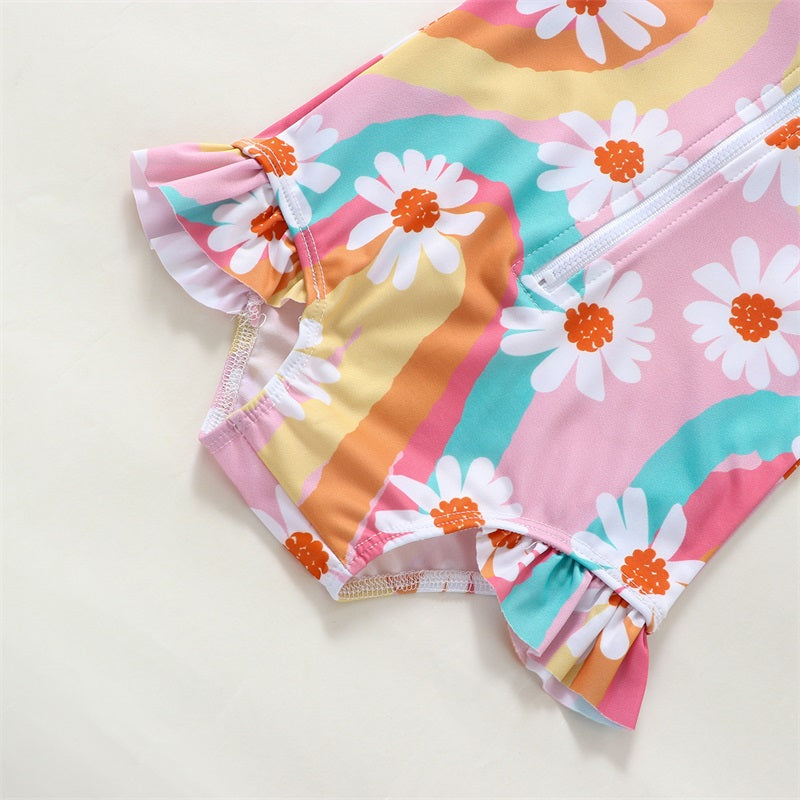 Baby Girl UV swimsuit with long sleeves and hat by Baby Bubble, featuring a front zipper, designed for sun protection.