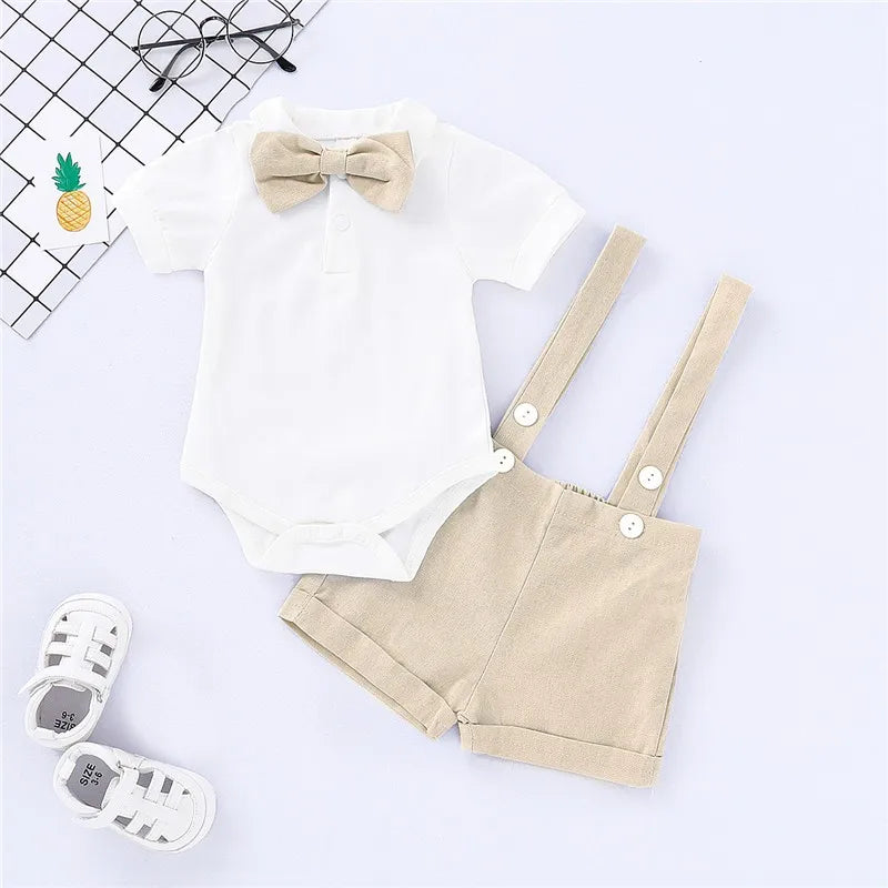 Newborn boy in Baby Bubble gentleman bowtie romper, summer set for ages 0-24 months, featuring a stylish bowtie and soft fabric.