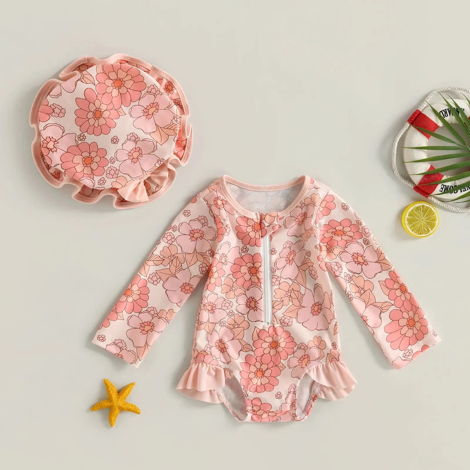 Baby Girl one-piece swimsuit with a floral flamingo print from Baby Bubble, featuring bright colors and a cute design for summer swimming.