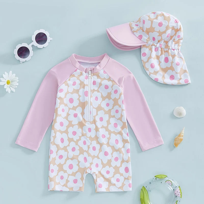 Baby girl rash guard set with floral and flamingo print from Baby Bubble, featuring a colorful, sun-protective swimsuit for infants.
