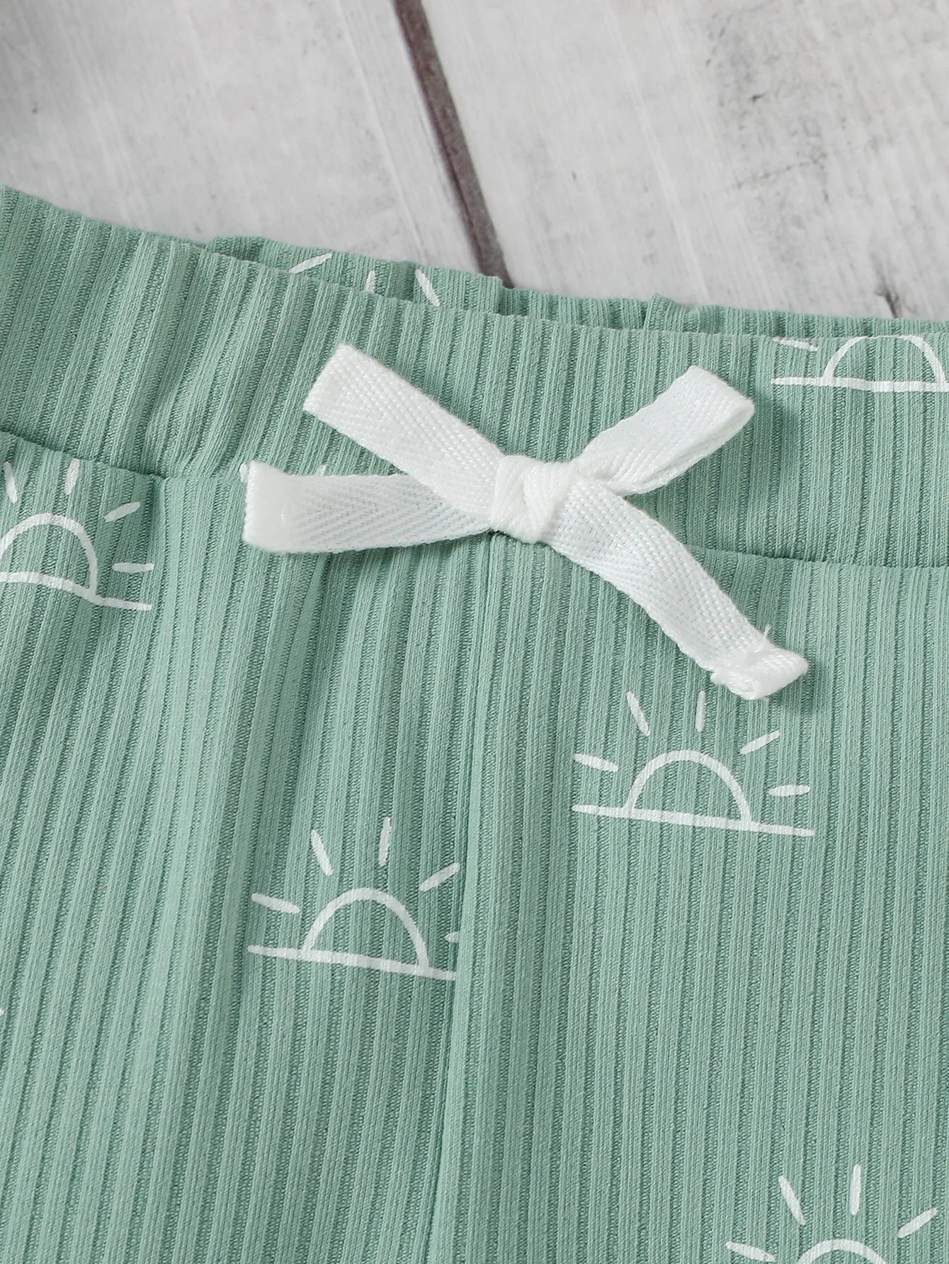 Baby Boy 2-piece outfit by Baby Bubble featuring a jumpsuit and matching pants, perfect for comfortable and cute baby wear.