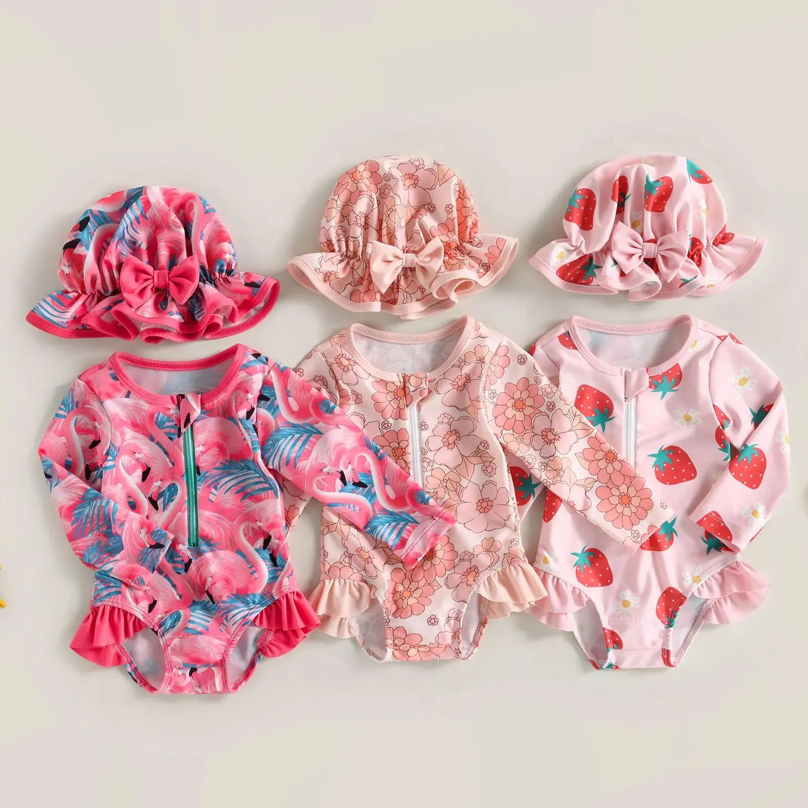 Baby Girl one-piece swimsuit with floral flamingo print by Baby Bubble, featuring colorful tropical design and comfortable fit.