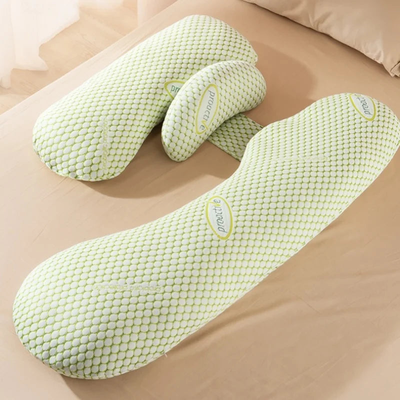 U-shaped pregnancy pillow by Baby Bubble providing full body sleep support for pregnant women, shown in a cozy bedroom setting.